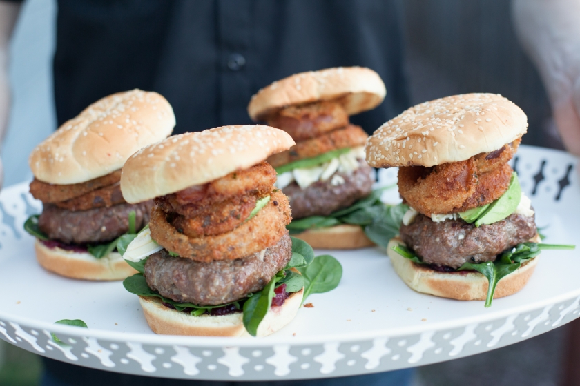 Burgers with Spinach, Avocado, Brie, Cranberry, Bacon and Onion Rings