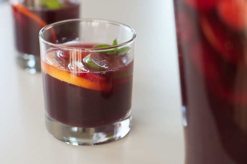 SUMMER SANGRIA WITH STRAWBERRIES, RASPBERRIES, PEACHES, CITRUS FRUIT AND GINGER