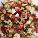 PANZANELLA WITH PANCETTA, HARD BOILED EGGS, CHERRY TOMATOES AND FRIED SAGE