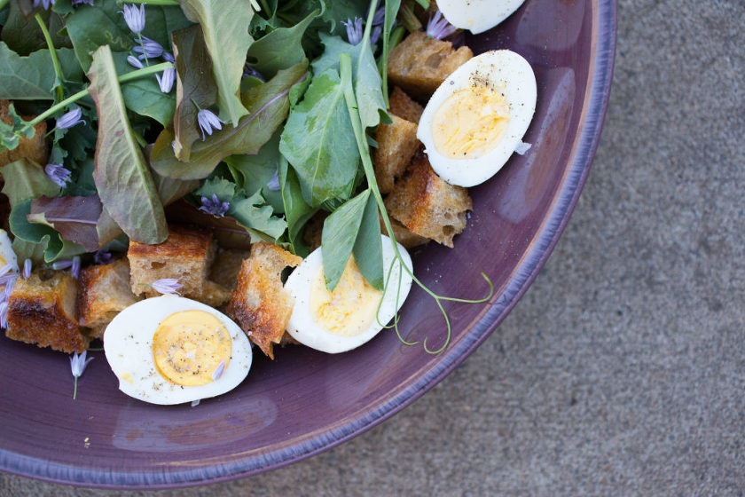 SALAD WITH HARD BOILED EGGS, GARLIC CROUTONS, FRIED CAPERS, AND BREADCRUMB DRESSING