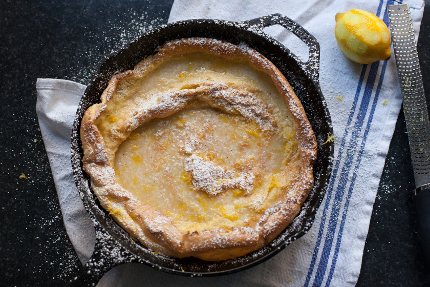 dutch baby with lemon syrup and lemon zest