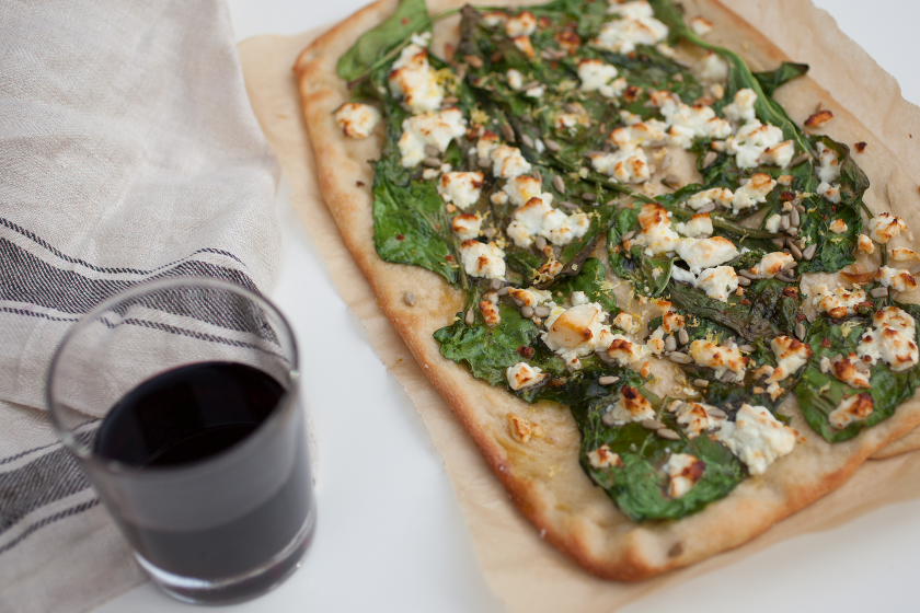 GARLIC SPINACH FLATBREAD WITH FETA, LEMON ZEST, AND SUNFLOWER SEEDS